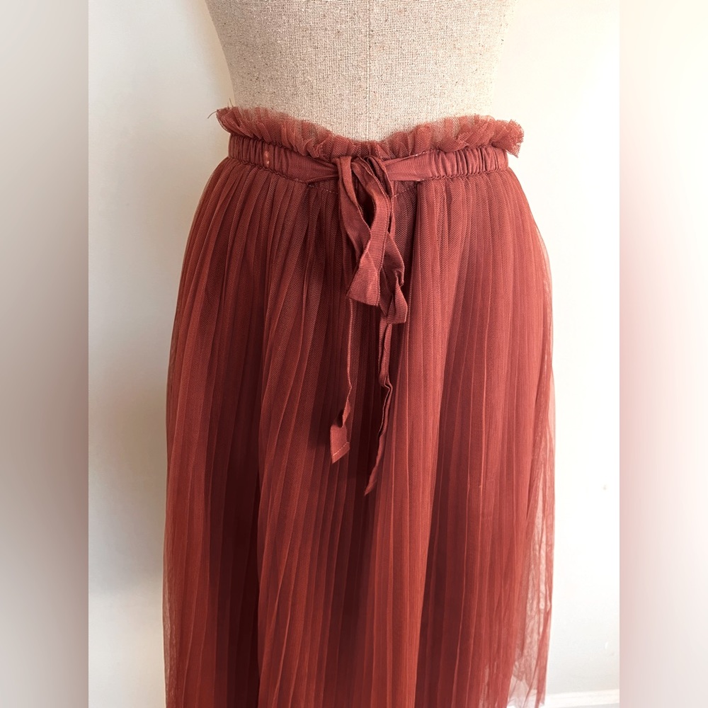 Ruffled pink skirt